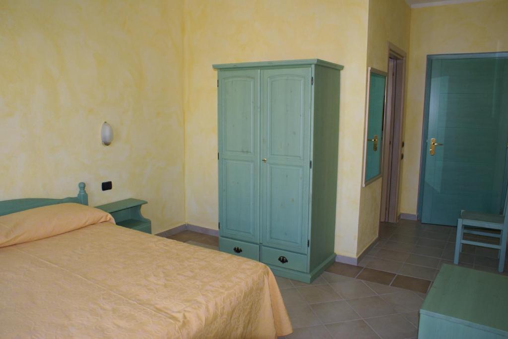 Albergo Residenziale Gli Ontani Cala Liberotto Bilik gambar